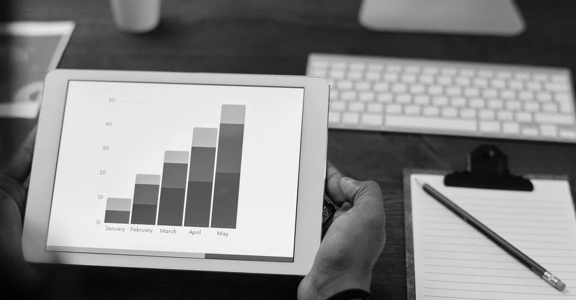 Man working on a bar chart